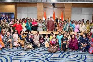 Delhi-based women refugees from Pakistan tie rakhi to Union Commerce and Industry Minister Piyush Goyal Delhi-based women refugees from Pakistan tie rakhi to Union Commerce and Industry Minister Piyush Goyal